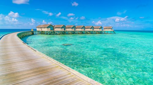 Beautiful water villas in tropical Maldives island